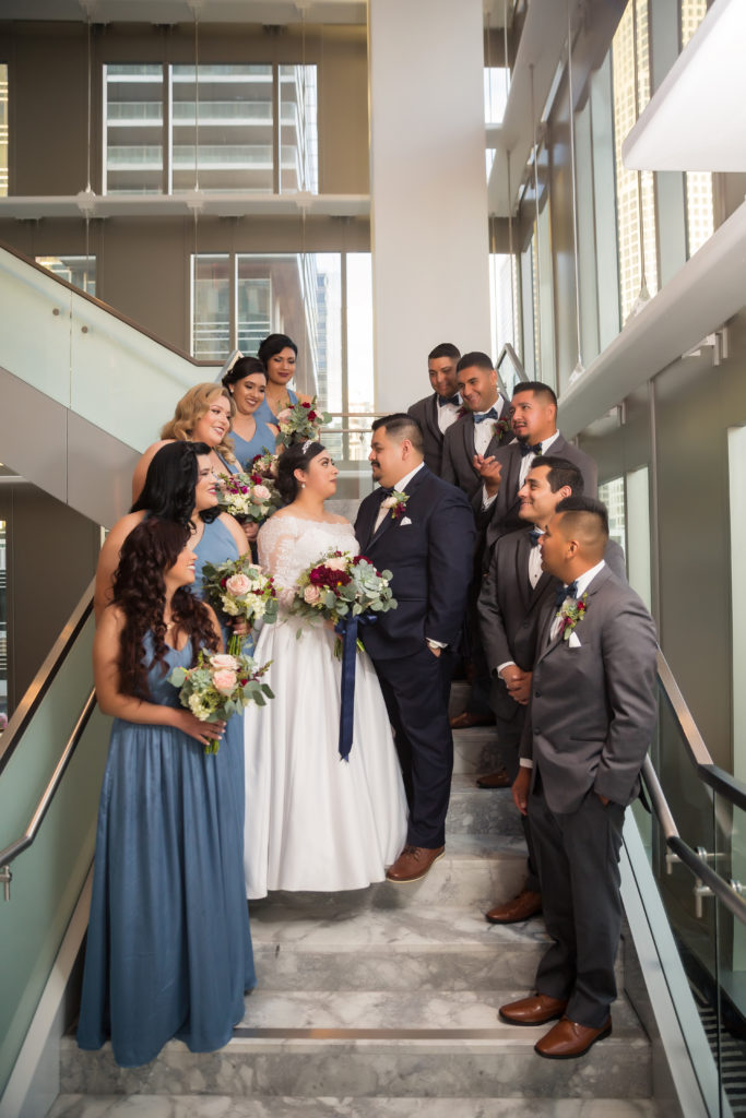 wedding party on staircase