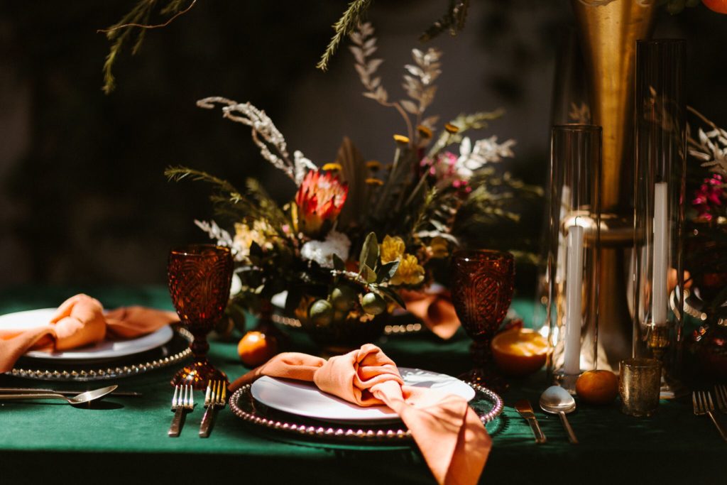 Autumn Wedding Table Design with Emerald and Orange Accents for the first-ever Vegan Wedding Show