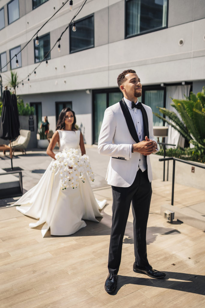 First look bride and groom rooftop Kimpton Everly