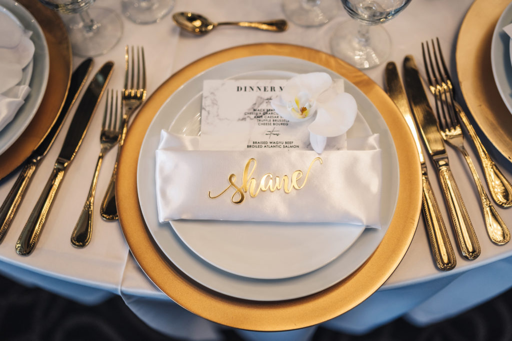 White and gold classic place setting