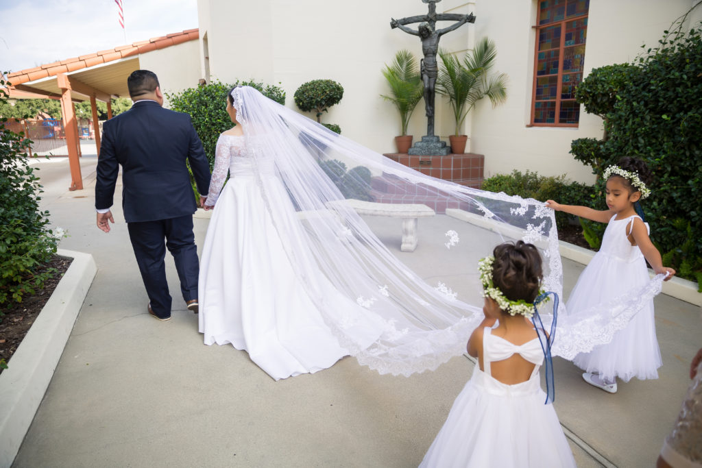 St Felicitas bride and groom veil and flower girls