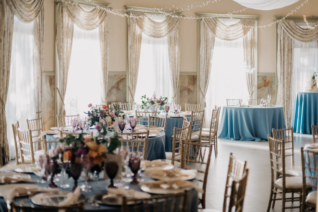 dusty blue whimsical wedding ballroom