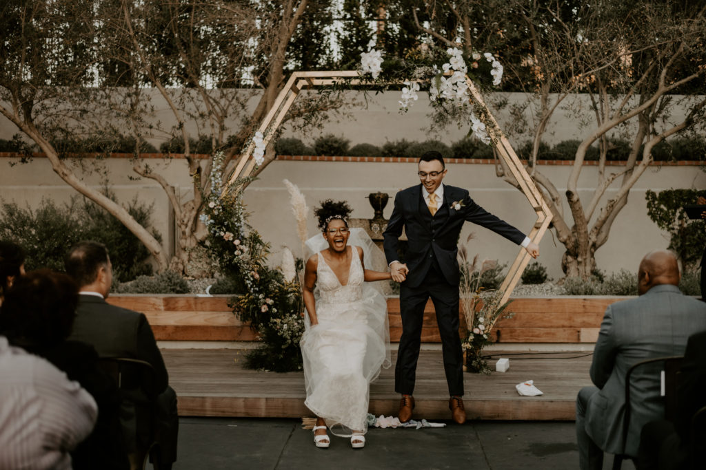Jumping the Broom Ceremony in The Harper's Courtyard