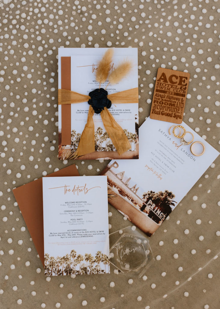Flay Lay with Wedding Invitation and Wedding Rings
