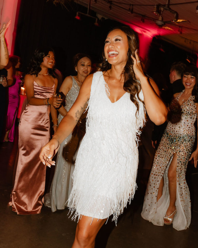 Bride's Second Look in White Fringe Dress